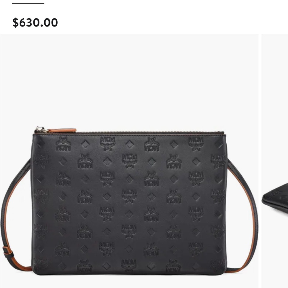 MCM Black Monogram Embossed Leather Travel Pouch
